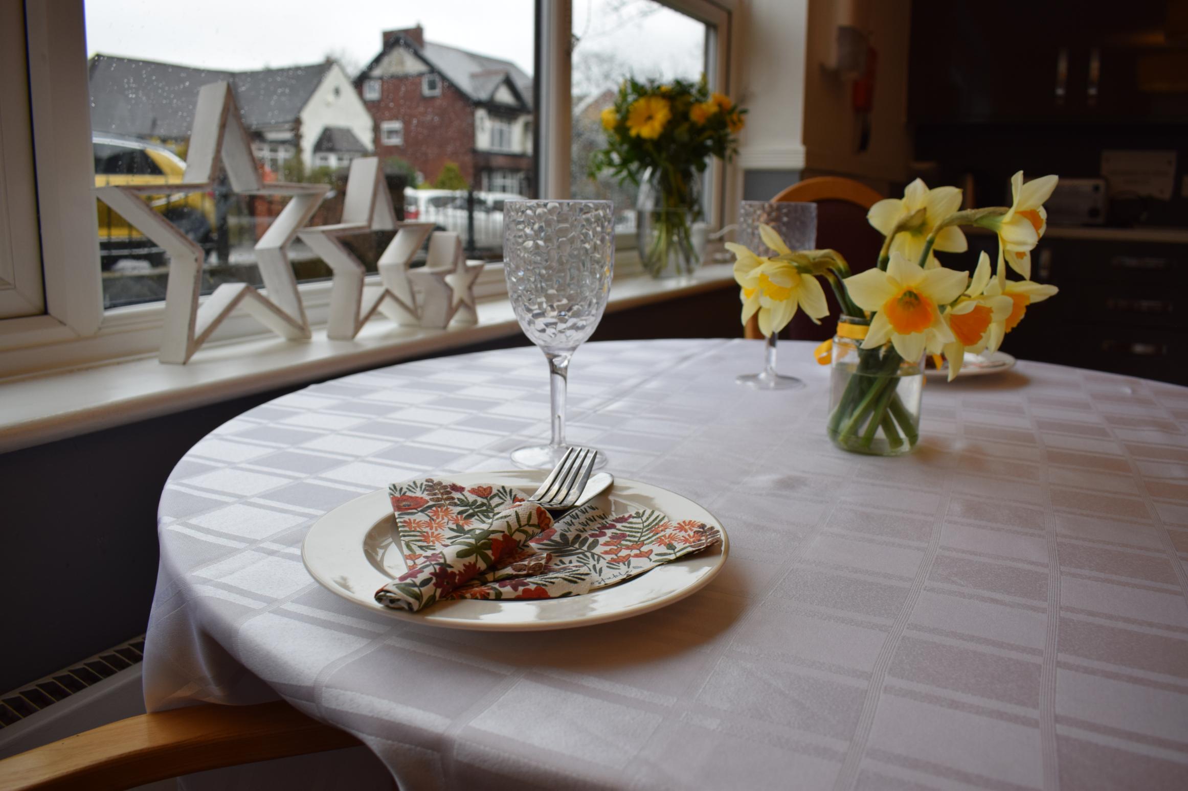 utensils and plate on dining table